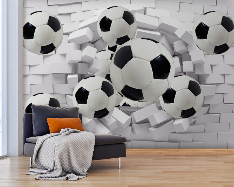 Skupina futbalových lôpt letiacich cez stenu Skupina futbalových lôpt letiacich cez stenu