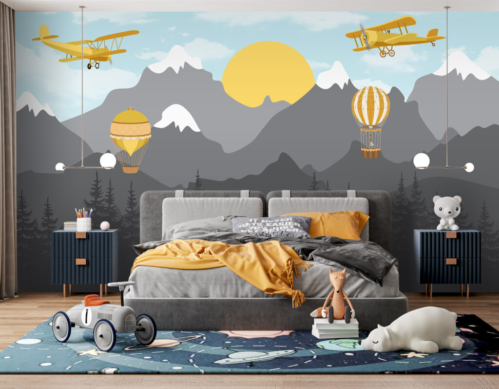 Yellow airplane flying over mountains