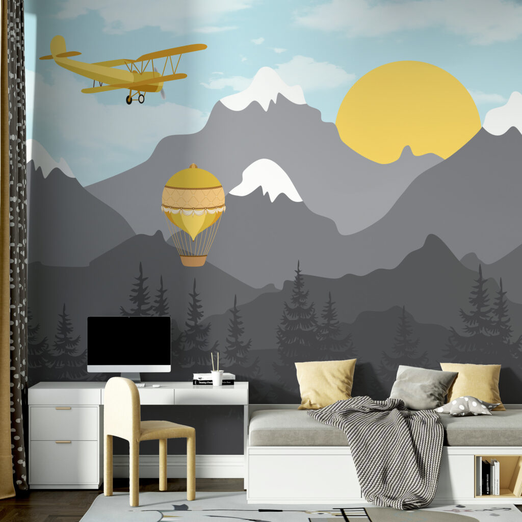 Yellow airplane flying over mountains