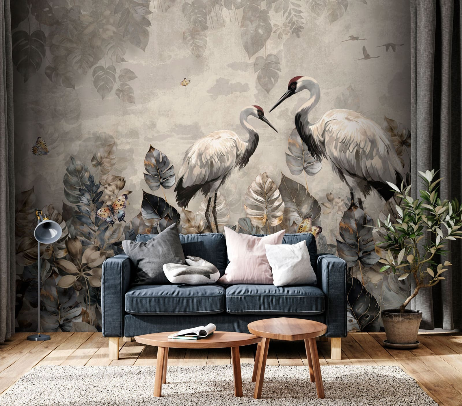 Couple of cranes standing in a field of leaves Couple of cranes standing in a field of leaves