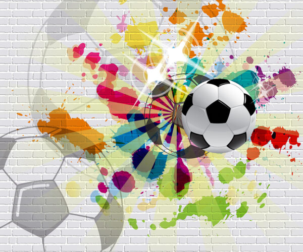 Futbalová lopta na tehlovej stene Futbalová lopta na tehlovej stene