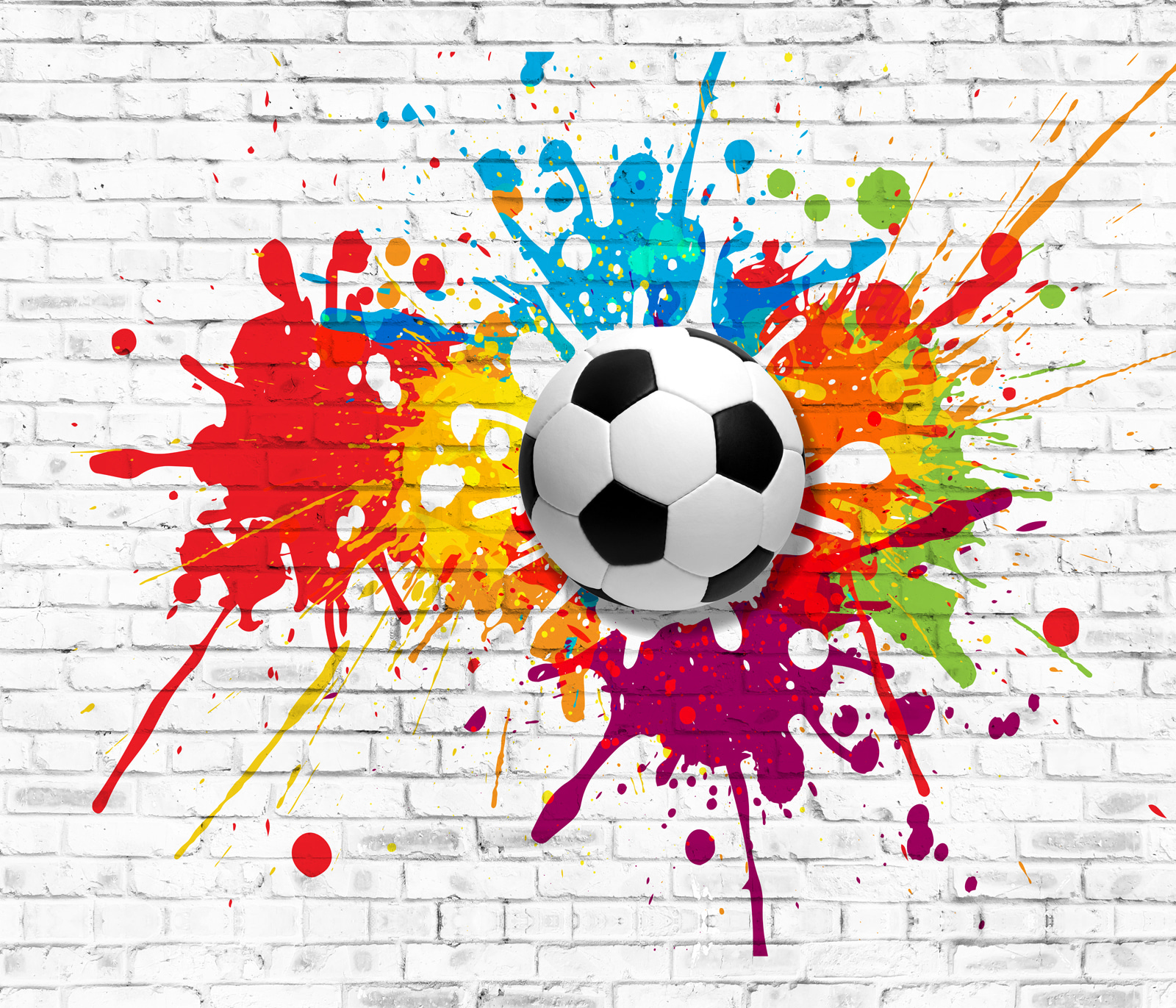 Football ball on a brick wall