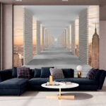 Fototapety Dlhý chodník so stĺpmi a mestom v pozadí