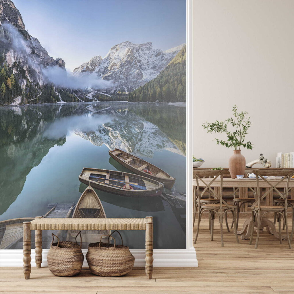 Boats on a lake with mountains in the background Boats on a lake with mountains in the background