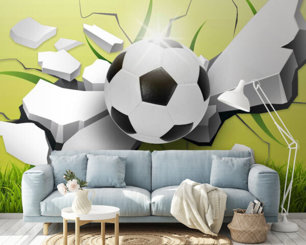Futbalová lopta prerážajúca stenu Futbalová lopta prerážajúca stenu