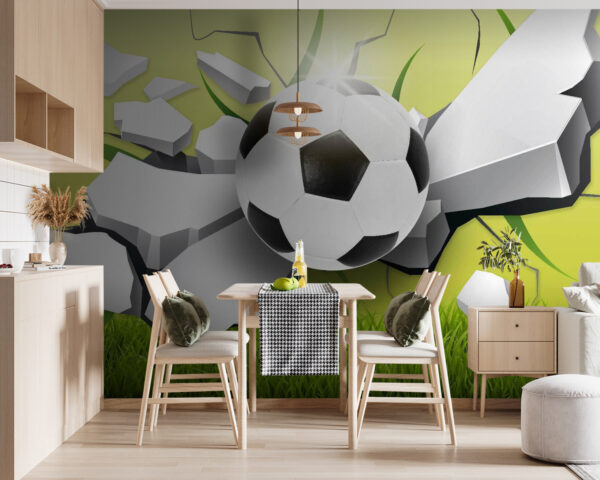 Futbalová lopta prerážajúca stenu Futbalová lopta prerážajúca stenu