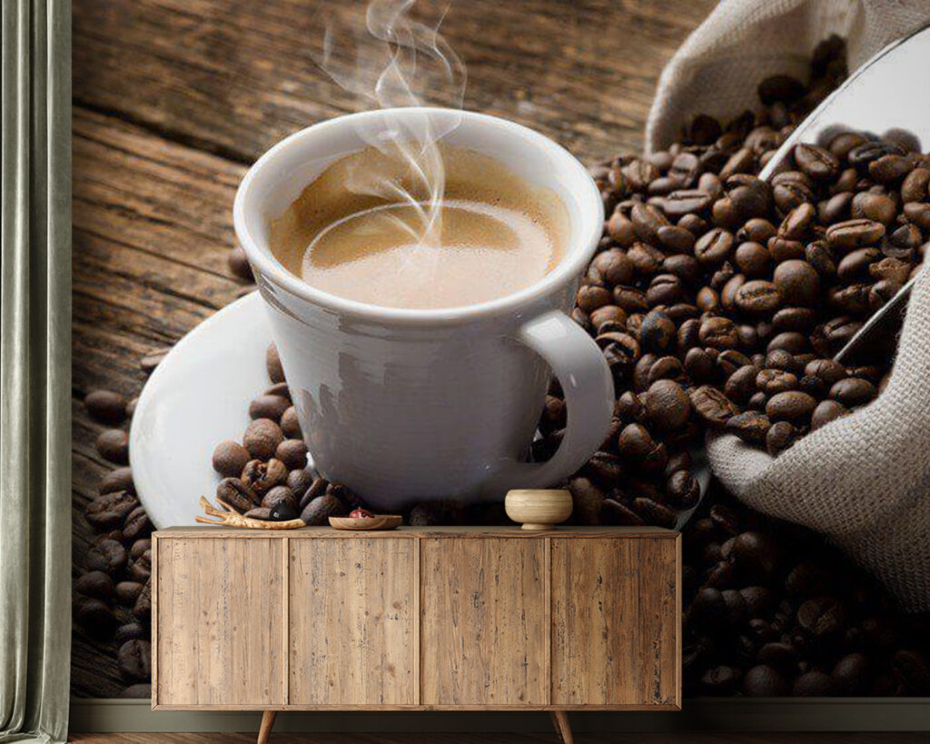 Cup of coffee on a saucer with coffee beans