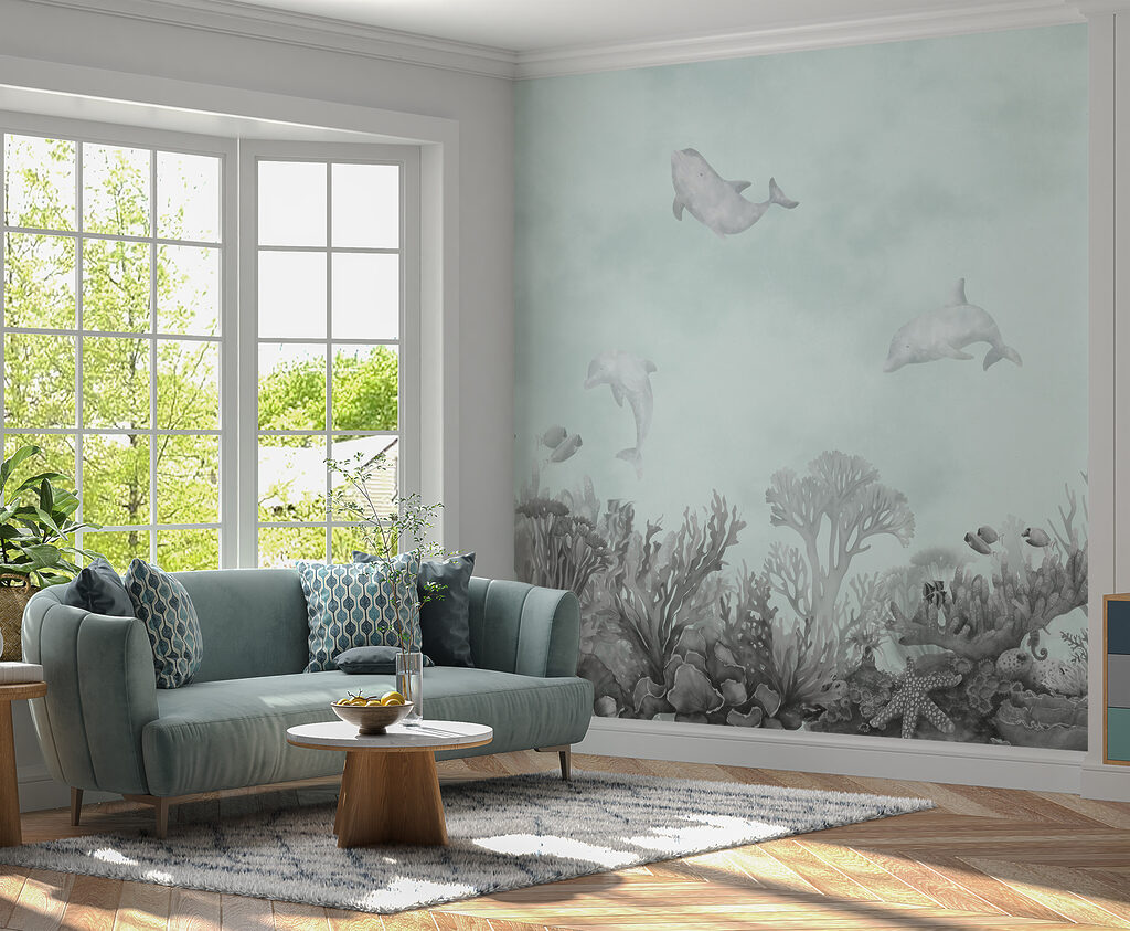 A group of dolphins swimming in the ocean