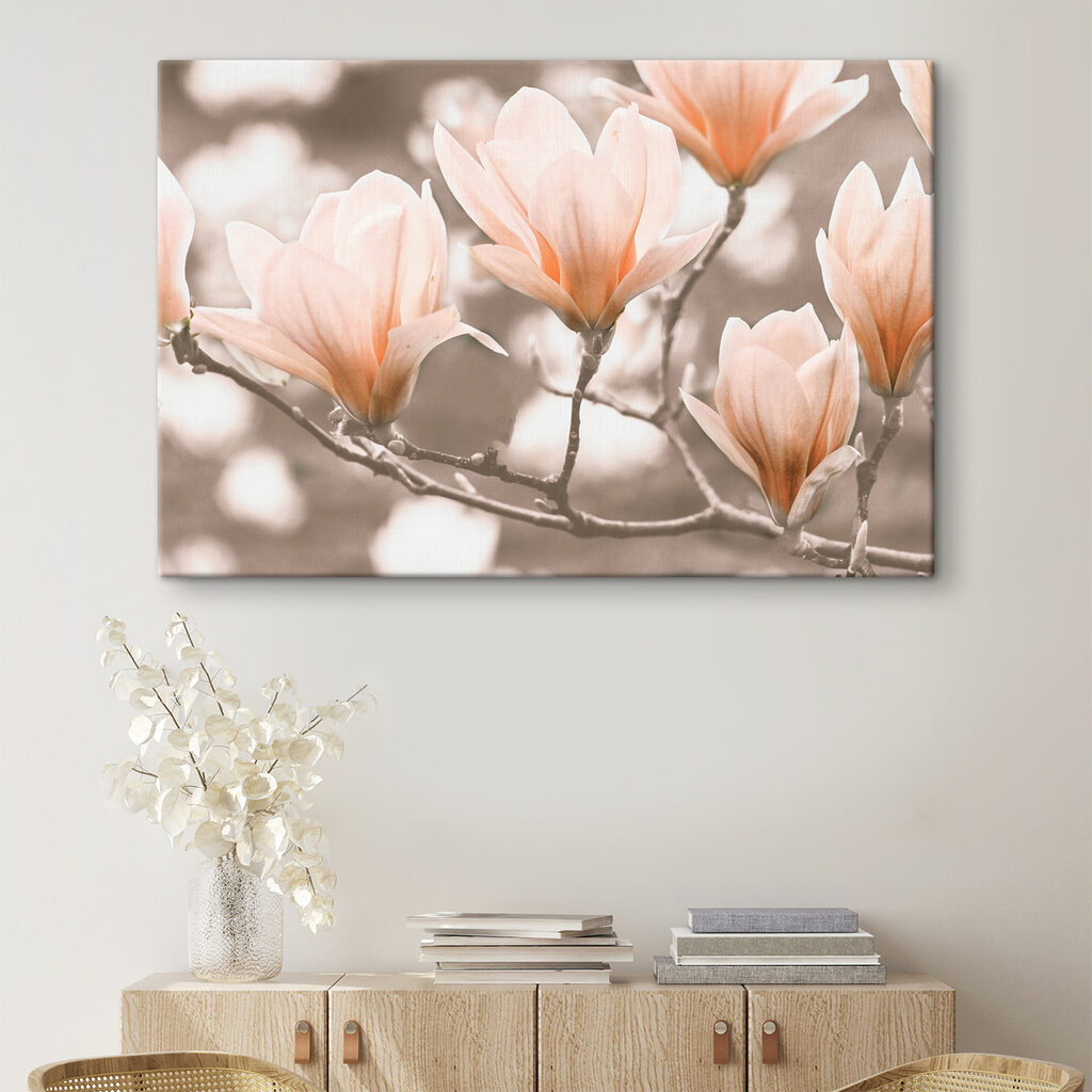 A group of flowers on a branch A group of flowers on a branch