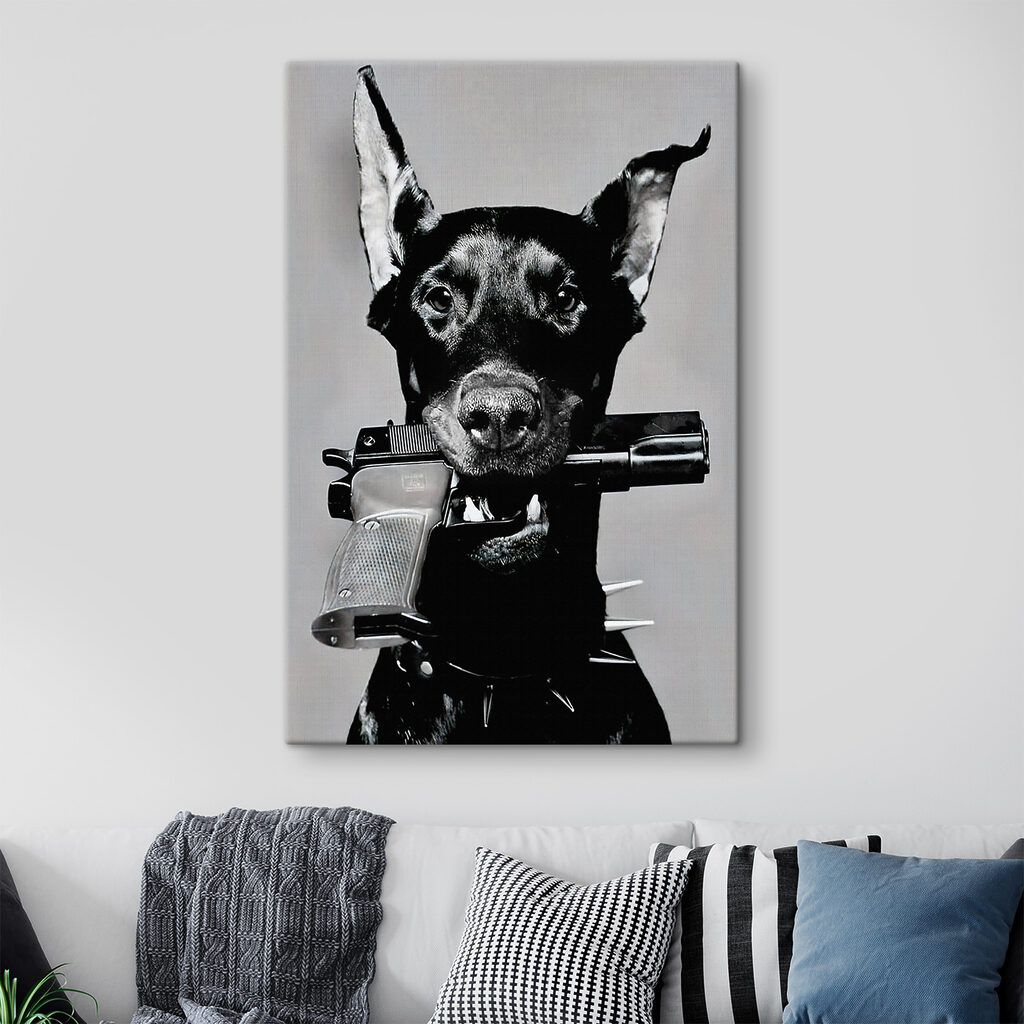 A dog holding a gun A dog holding a gun