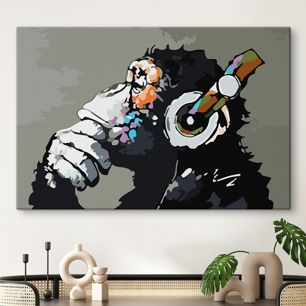 A cartoon of a monkey holding a headphone A cartoon of a monkey holding a headphone