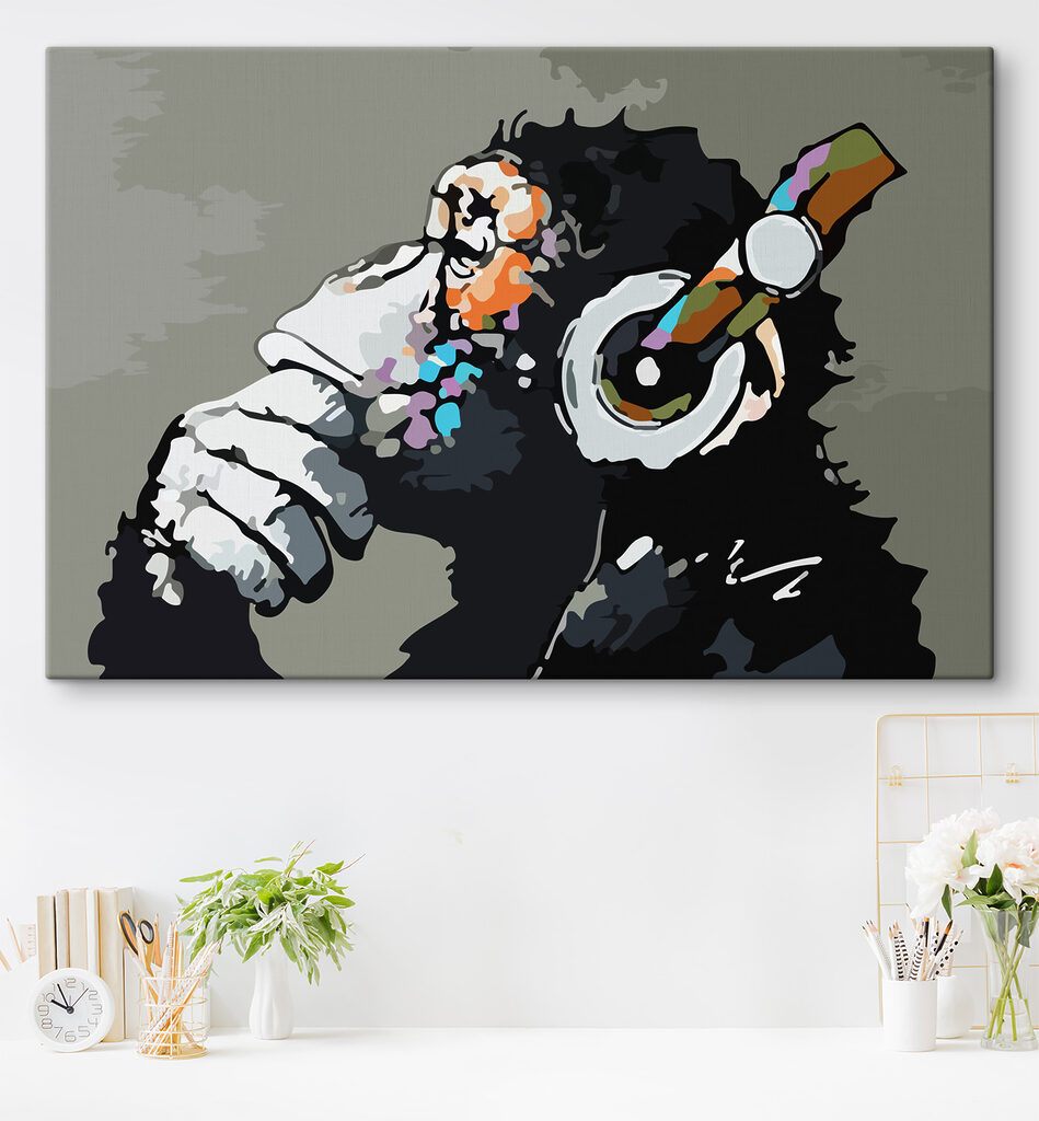 A cartoon of a monkey holding a headphone A cartoon of a monkey holding a headphone