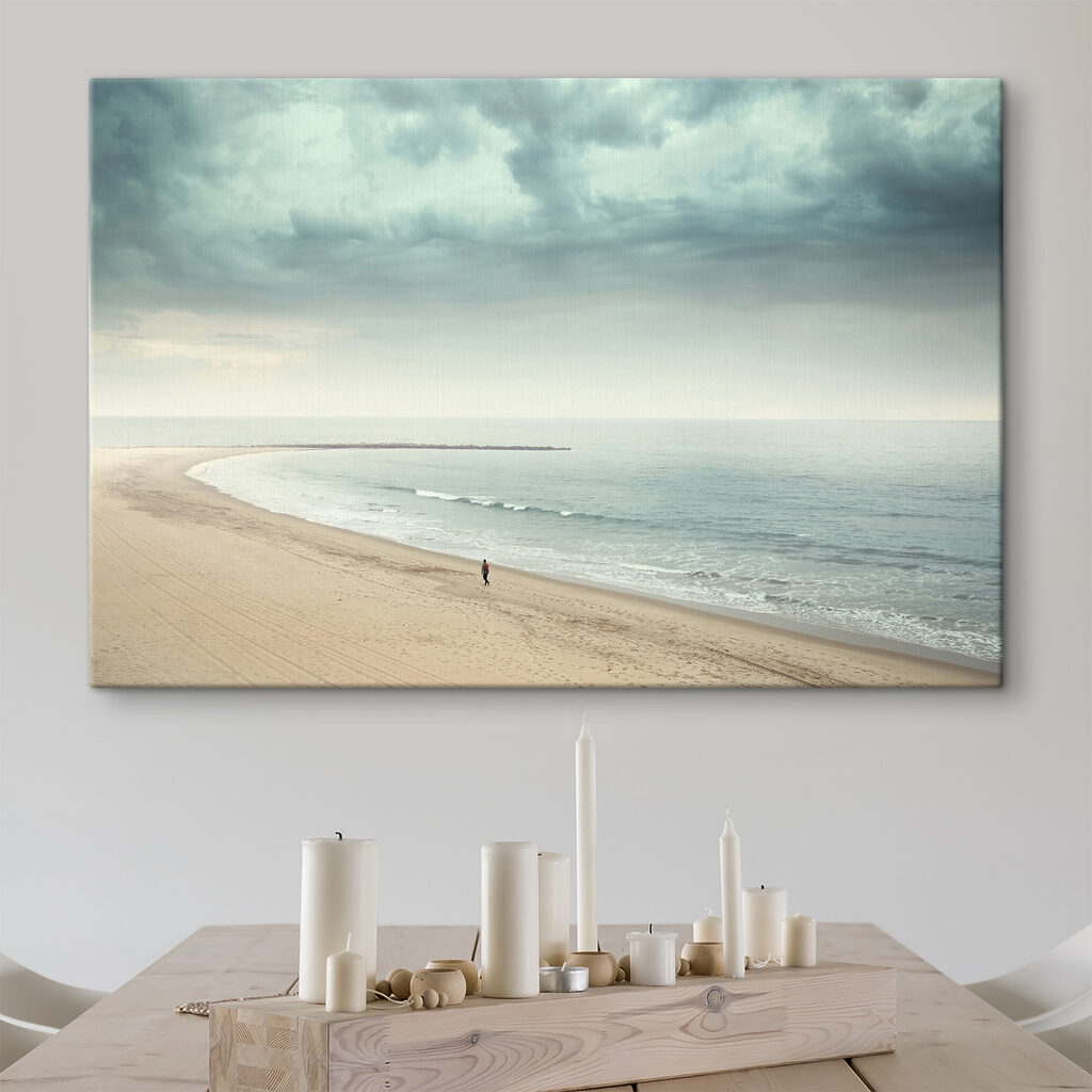 A person walking on a beach