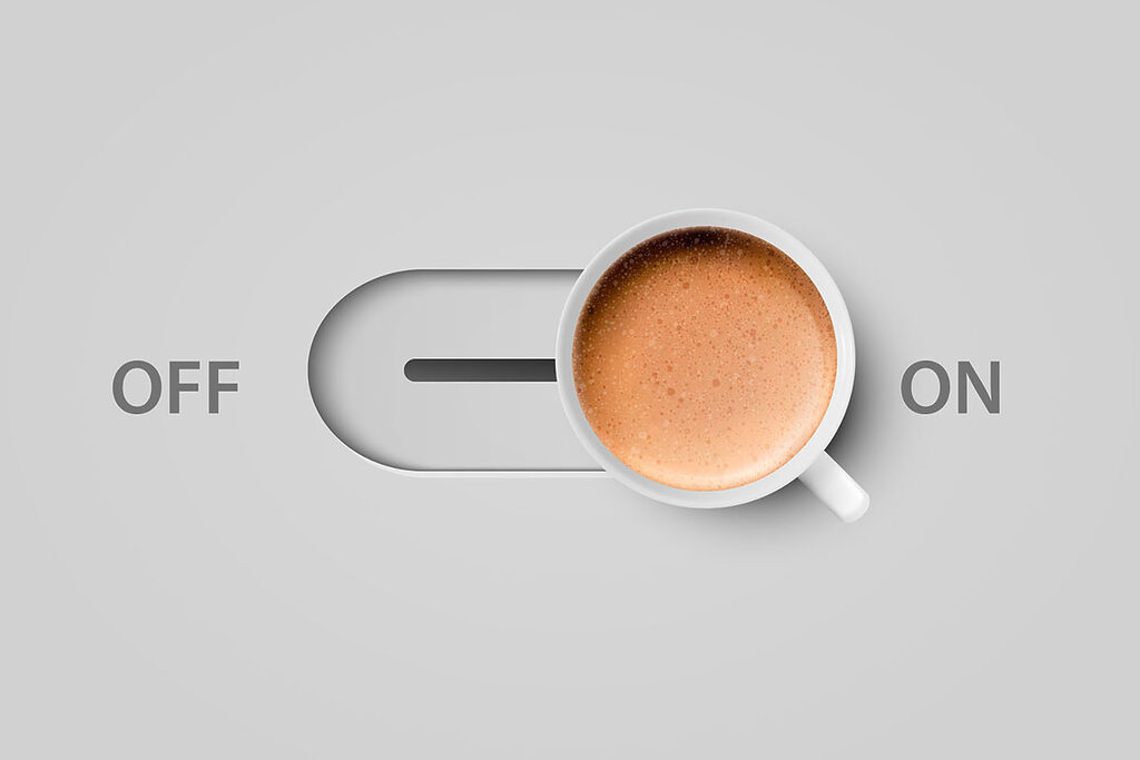 A cup of coffee on a switch A cup of coffee on a switch