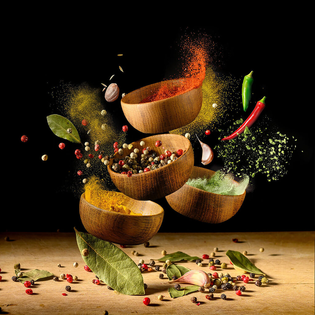 A group of bowls with spices and herbs A group of bowls with spices and herbs