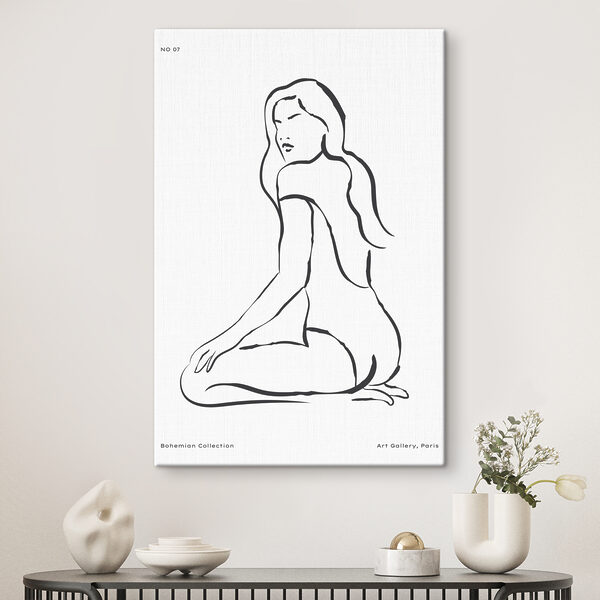 A drawing of a woman sitting