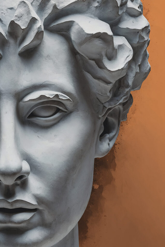 A statue of a man's face A statue of a man's face