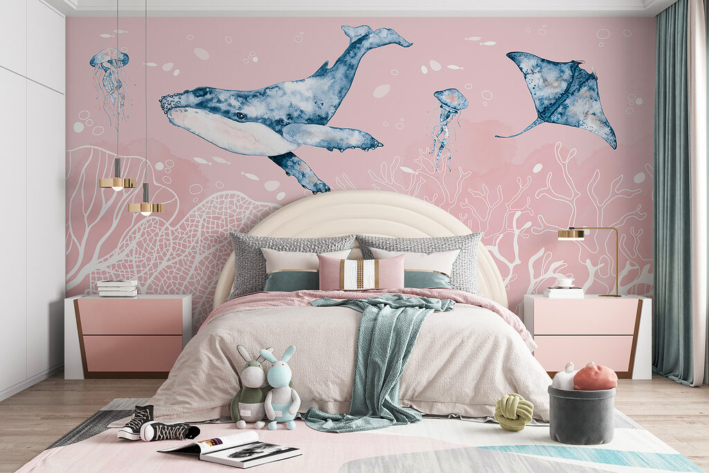 A whale and stingrays swimming in the ocean A whale and stingrays swimming in the ocean