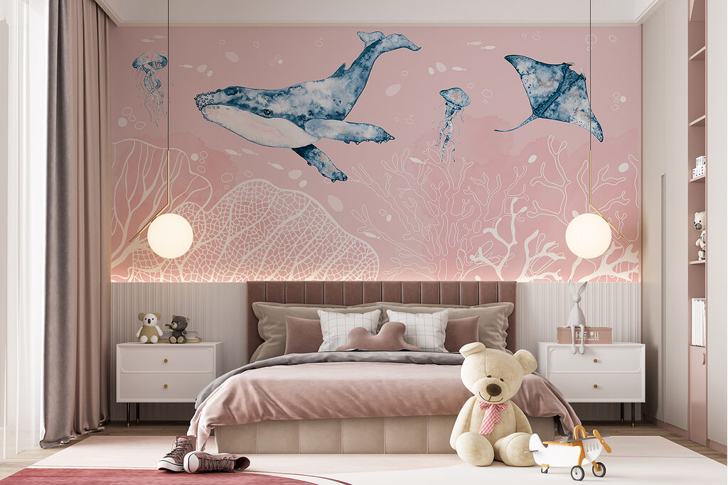 A whale and stingrays swimming in the ocean A whale and stingrays swimming in the ocean