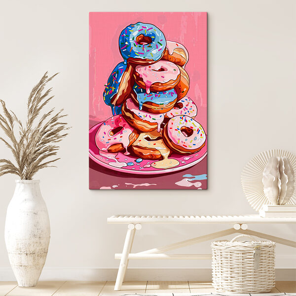 A stack of donuts with frosting and sprinkles A stack of donuts with frosting and sprinkles