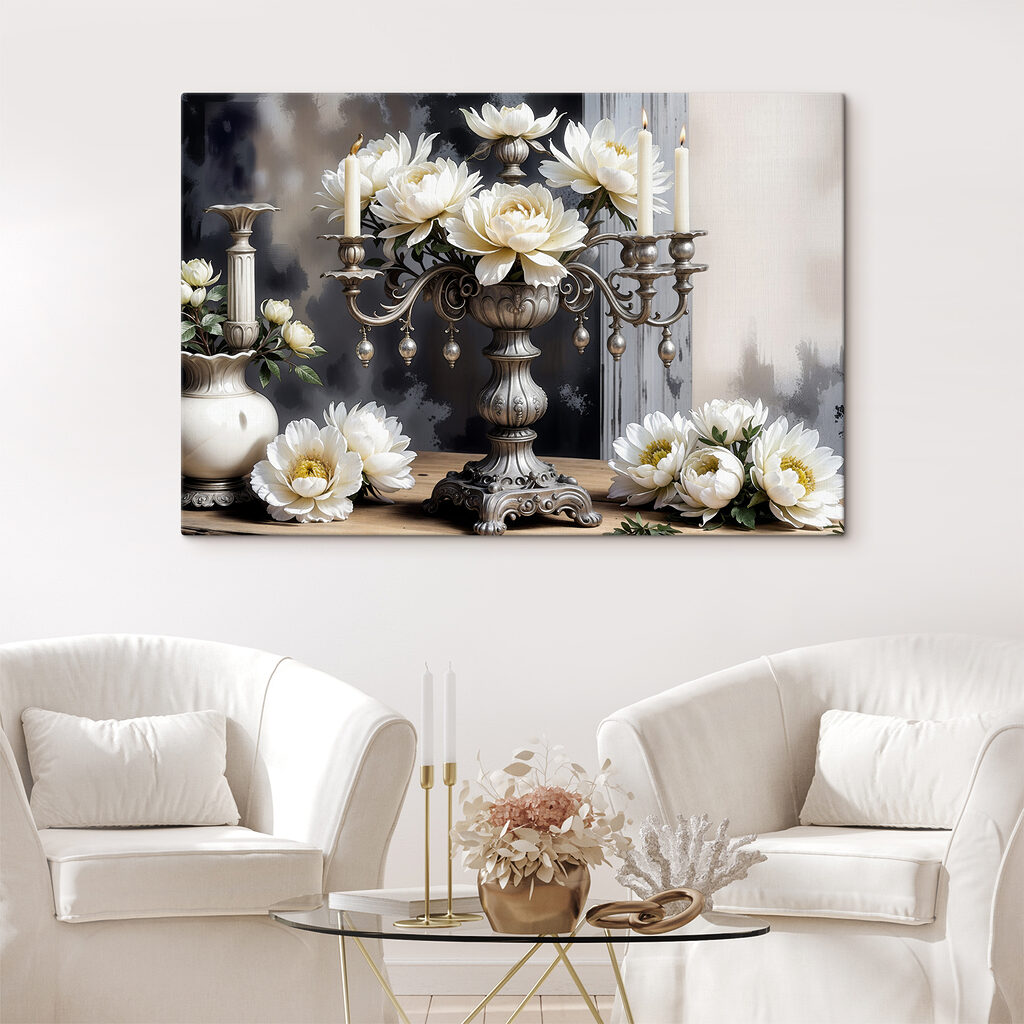 A silver candelabra with white flowers