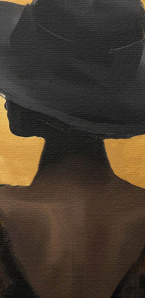 Woman in a black dress and hat