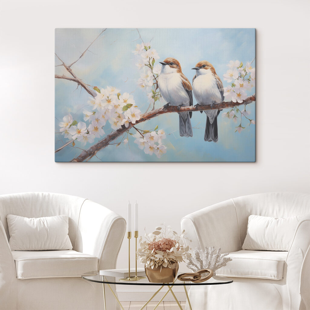 Two birds on a branch with white flowers