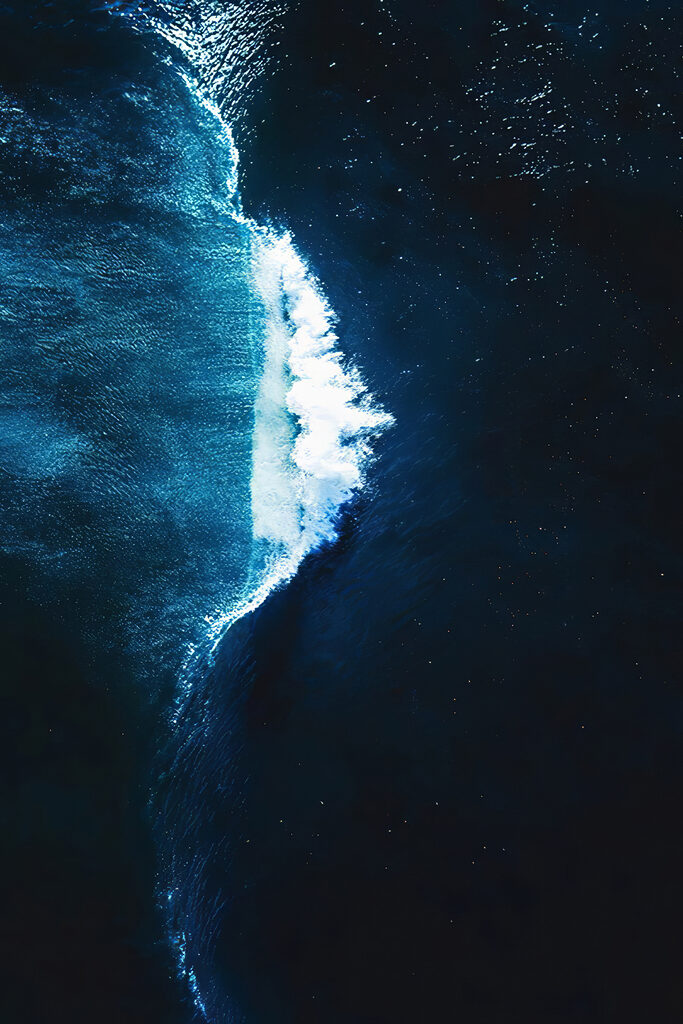 Wave crashing into the ocean