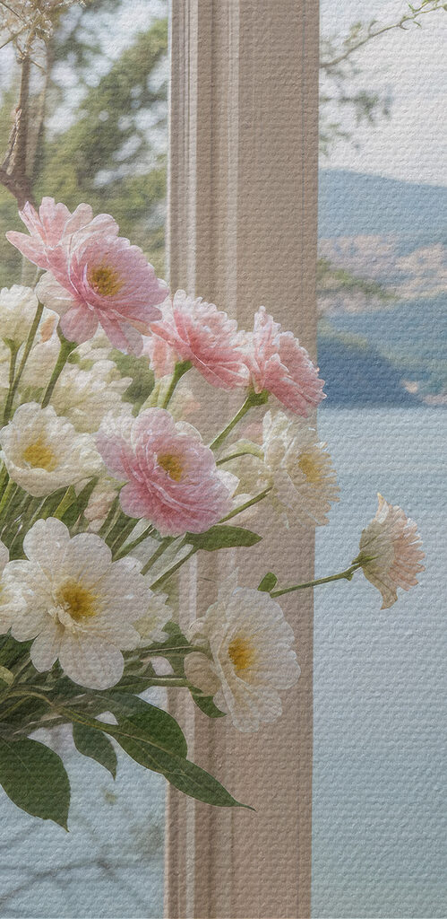 Vase of flowers in front of a window