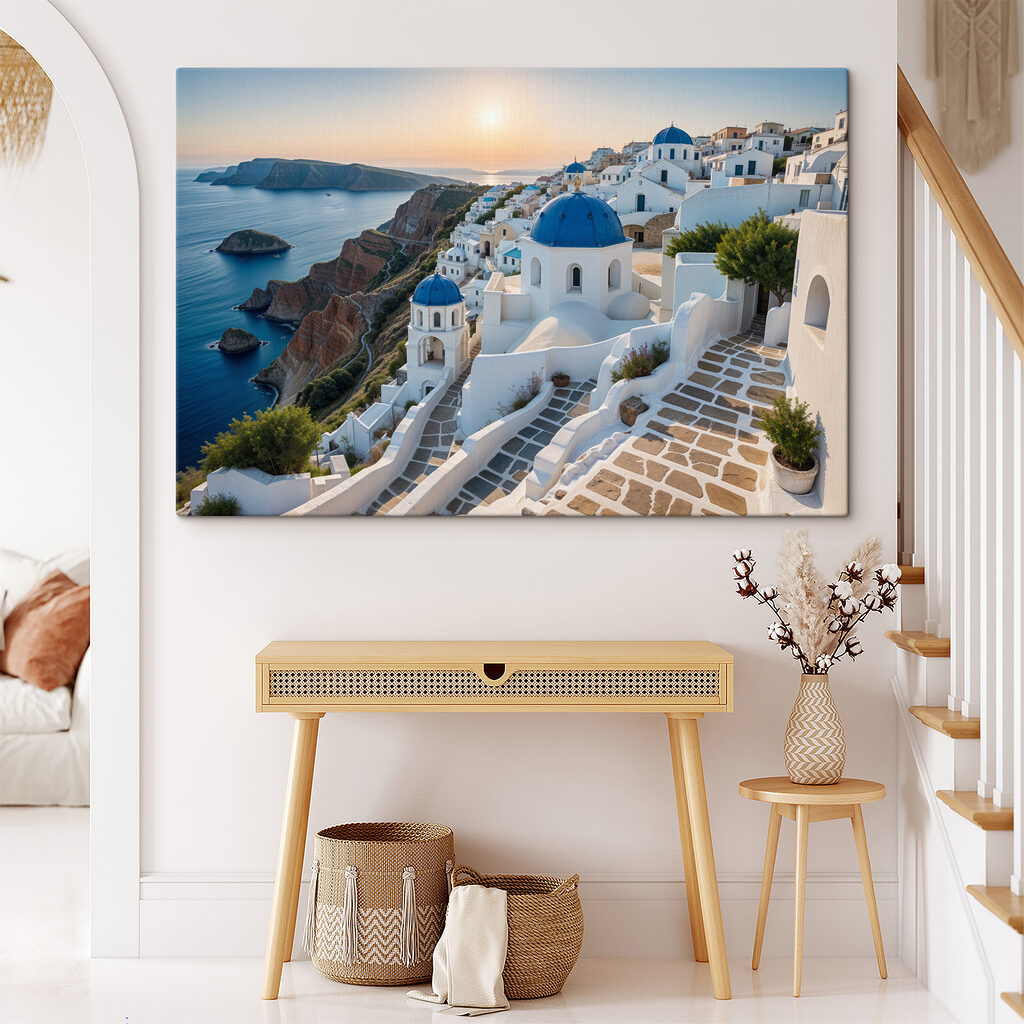 White buildings with blue domes on a hill with a body of water in the background