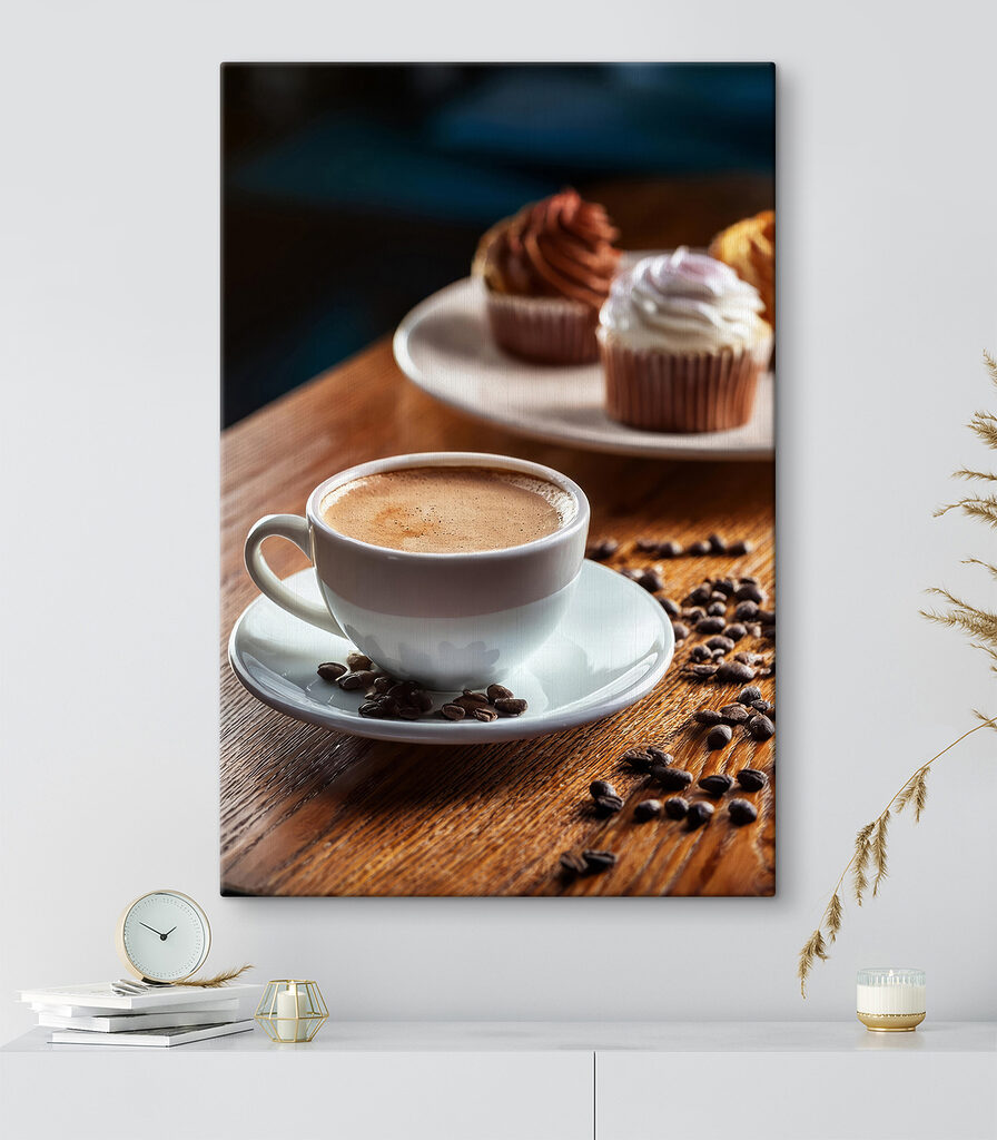 Cup of coffee and cupcakes on a table Cup of coffee and cupcakes on a table