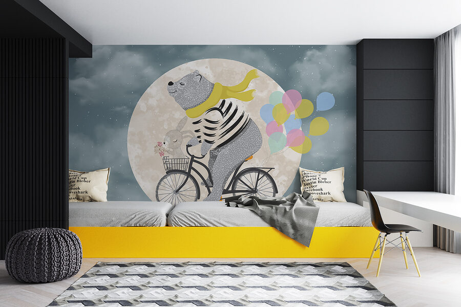 Medveď na bicykli s balónmi