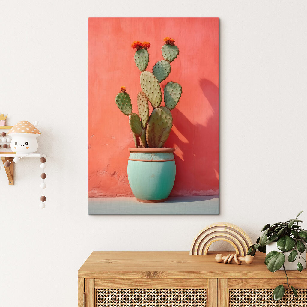Cactus in a pot against a wall Cactus in a pot against a wall