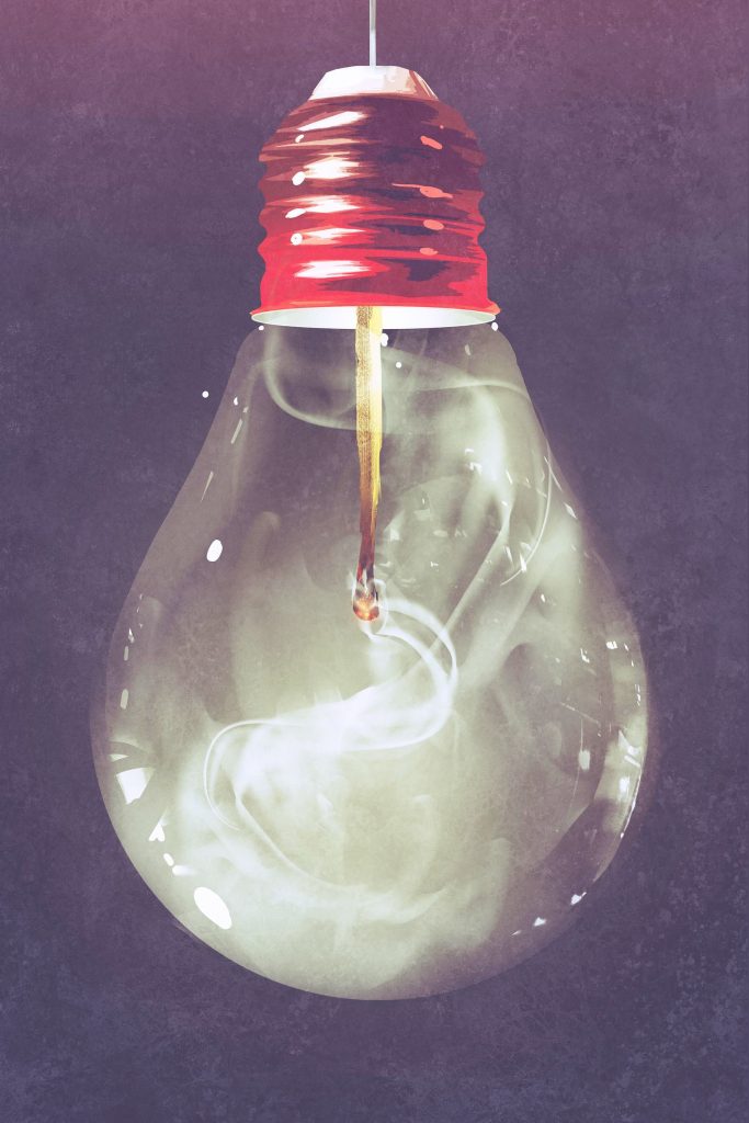 Light bulb with a fire Light bulb with a fire