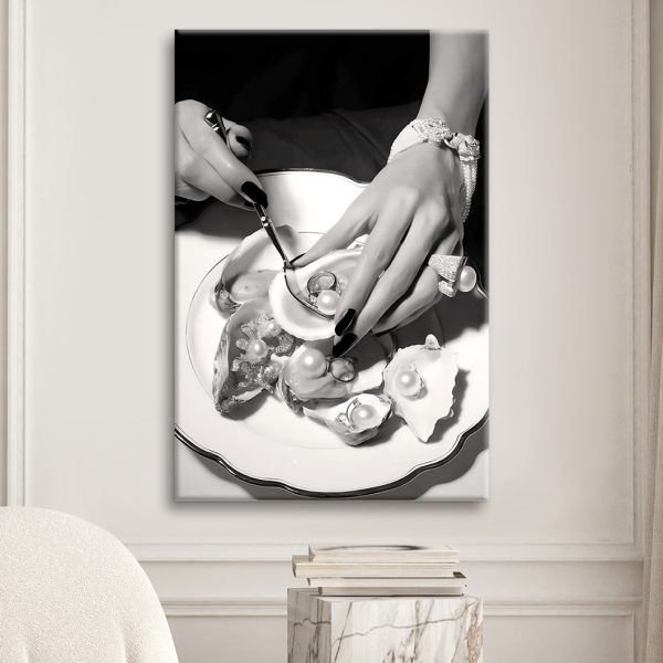 Woman holding a spoon and a oyster