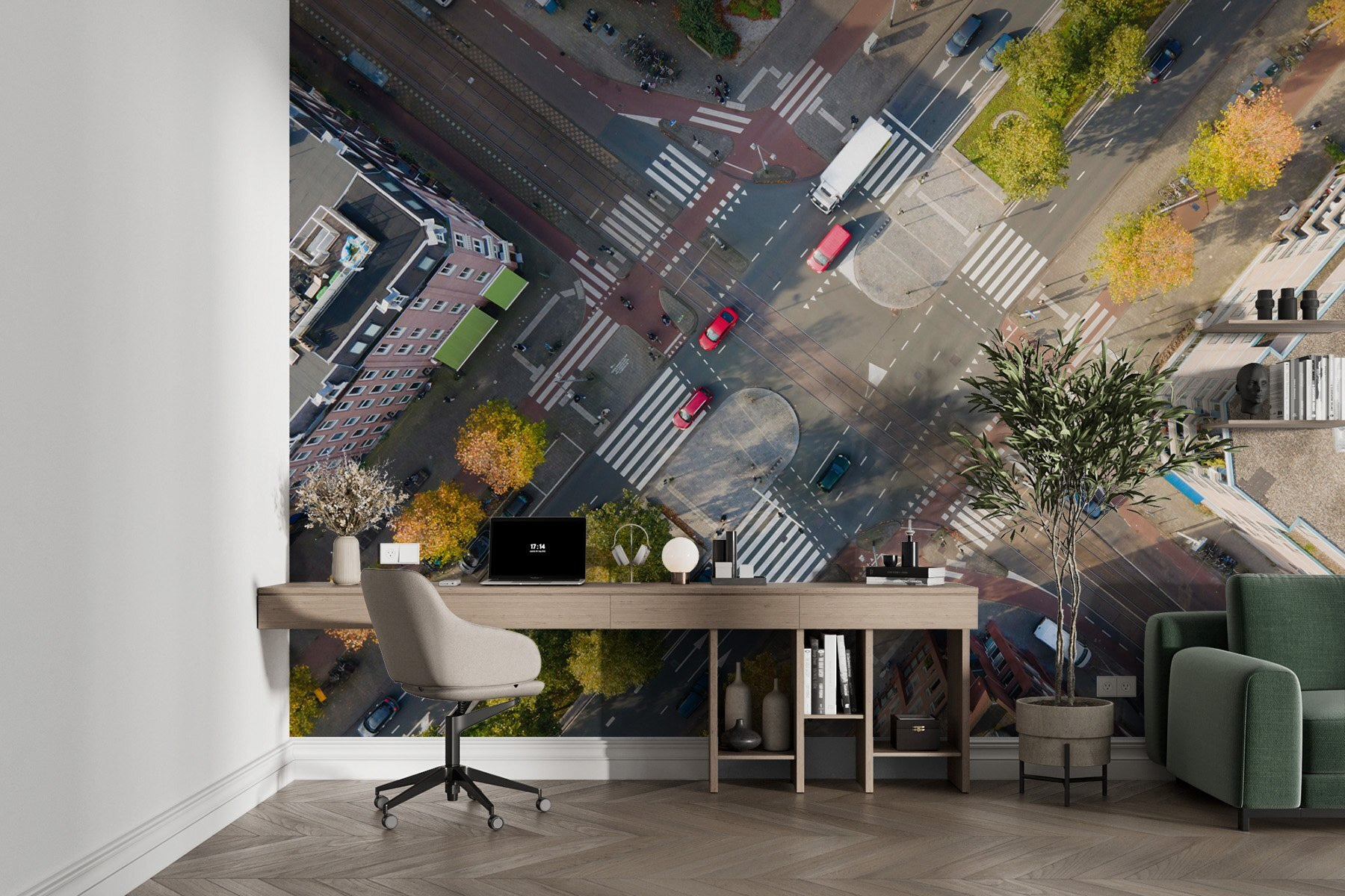 Aerial view of a street intersection with cars and buildings