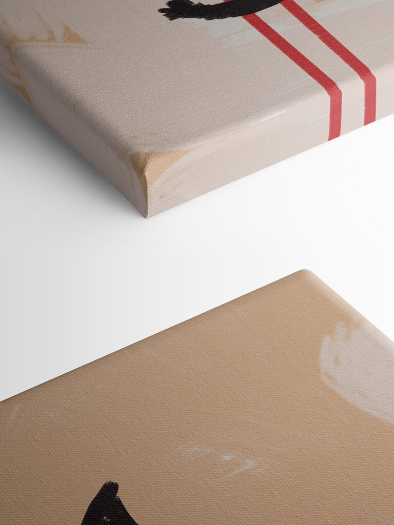 Black cat sitting on a red chair