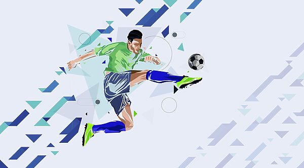 Muž kopajúci do futbalovej lopty Muž kopajúci do futbalovej lopty