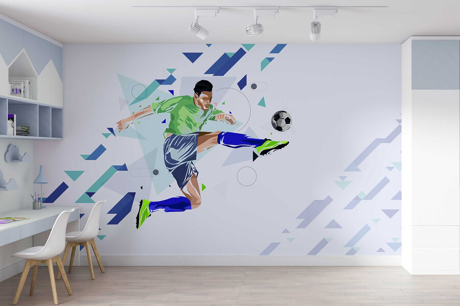 Muž kopajúci do futbalovej lopty