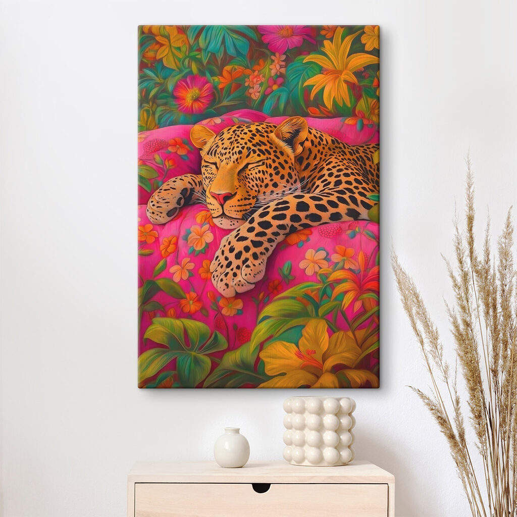 Leopard sleeping on a pink couch
