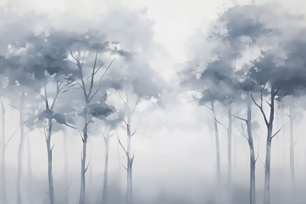 Group of trees in a foggy forest