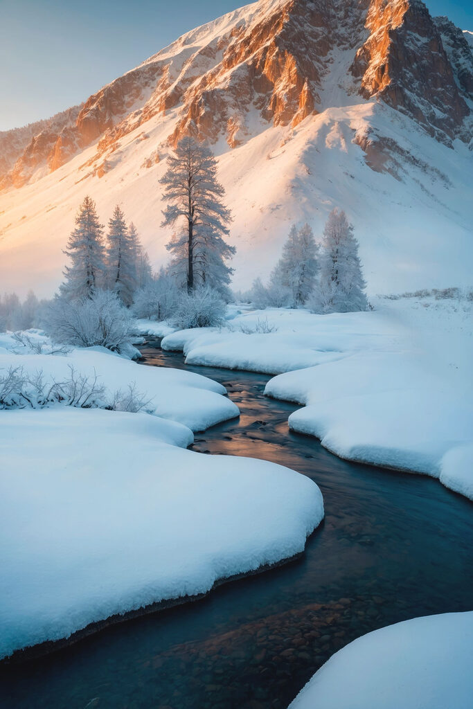 River running through a snowy mountain River running through a snowy mountain