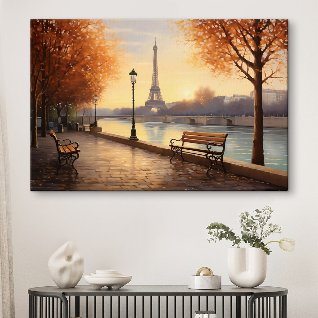 Bench and a river with trees and a tower in the background
