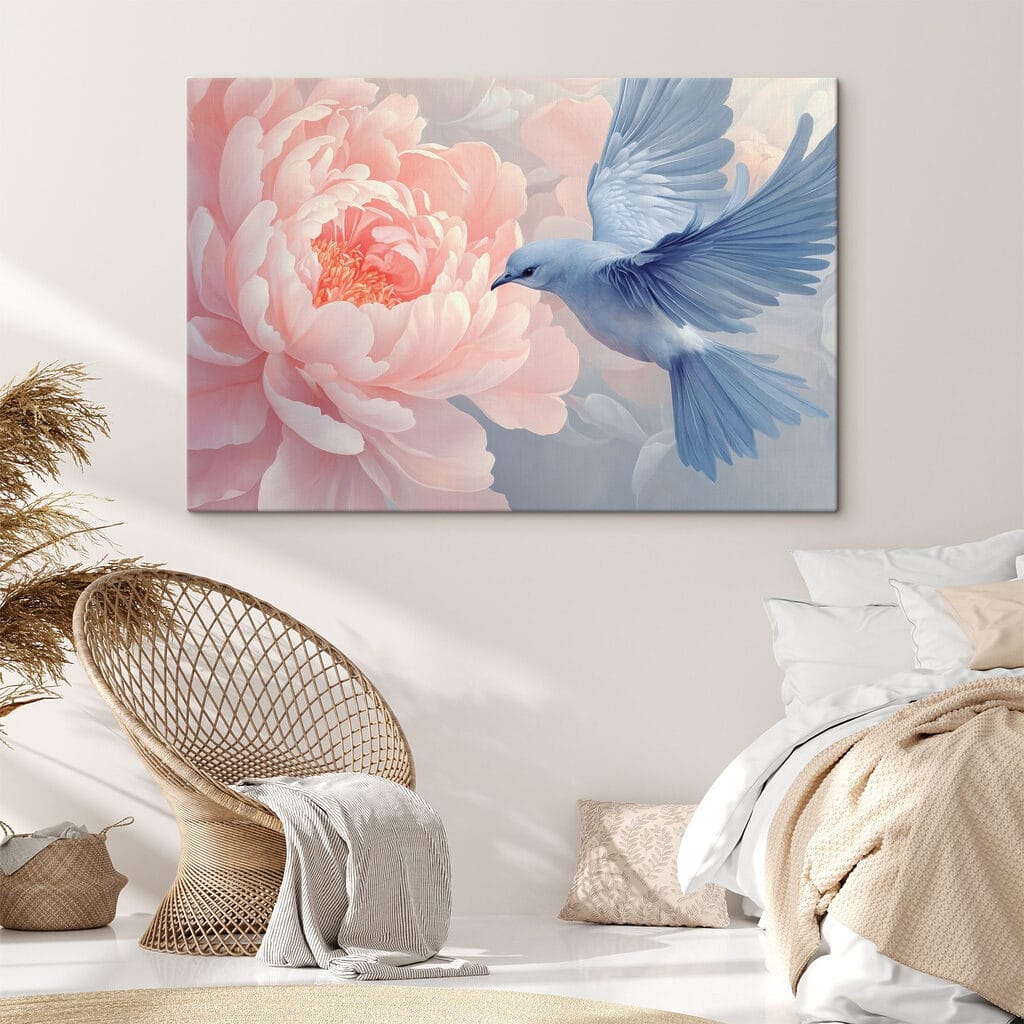 Bird flying next to a flower