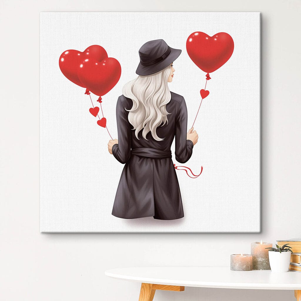 Woman holding a heart shaped balloon
