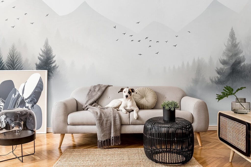 Birds flying over a foggy forest