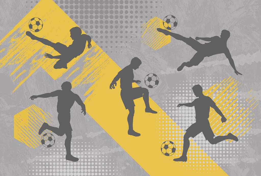 Skupina mužov hrajúcich futbal Skupina mužov hrajúcich futbal