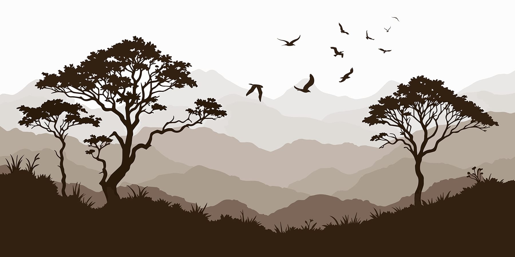 Birds flying over a mountain range