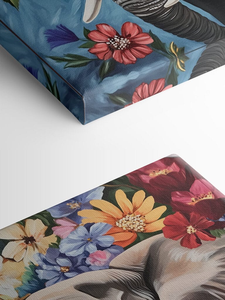 An elephant with tusks in a flower garden