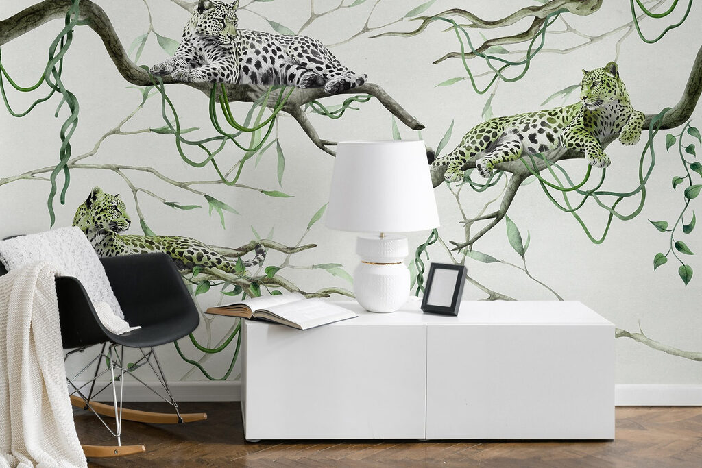 Group of leopards lying on branches Group of leopards lying on branches